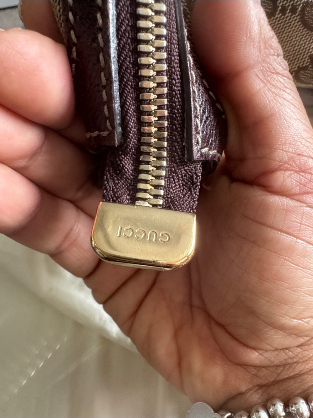 Gucci Dark Brown Pouch with Gold-Tone Zipper Pull